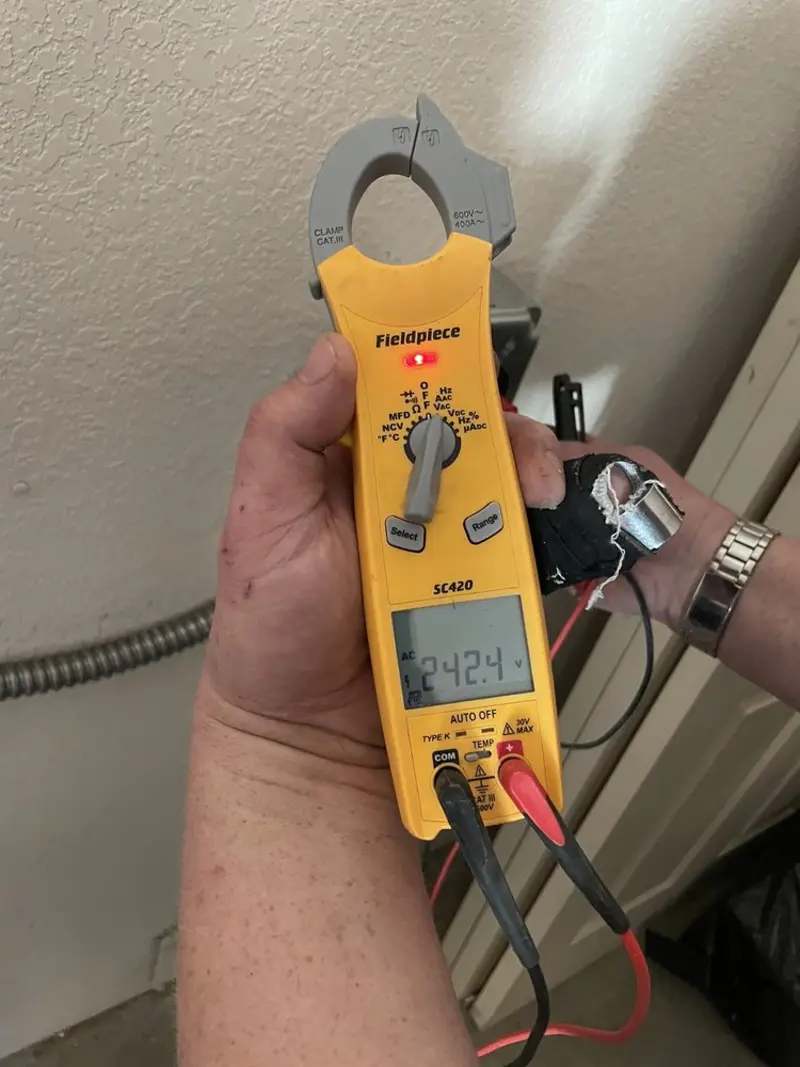 Voltage testing with clamp meter during Circuit Breaker Repair in Shorewood